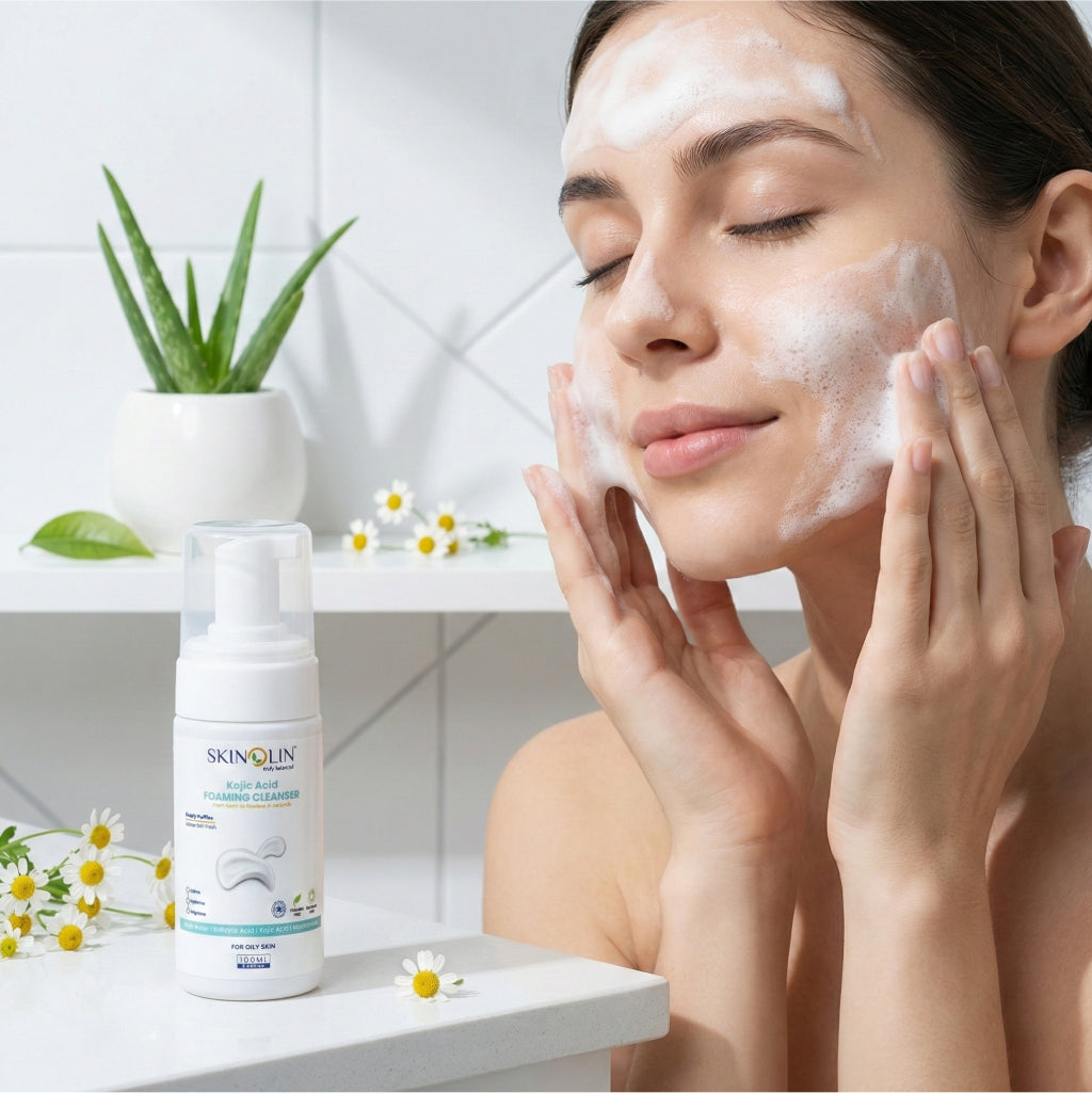 Woman washing her face with Skinolin Kojic Acid Foaming Cleanser